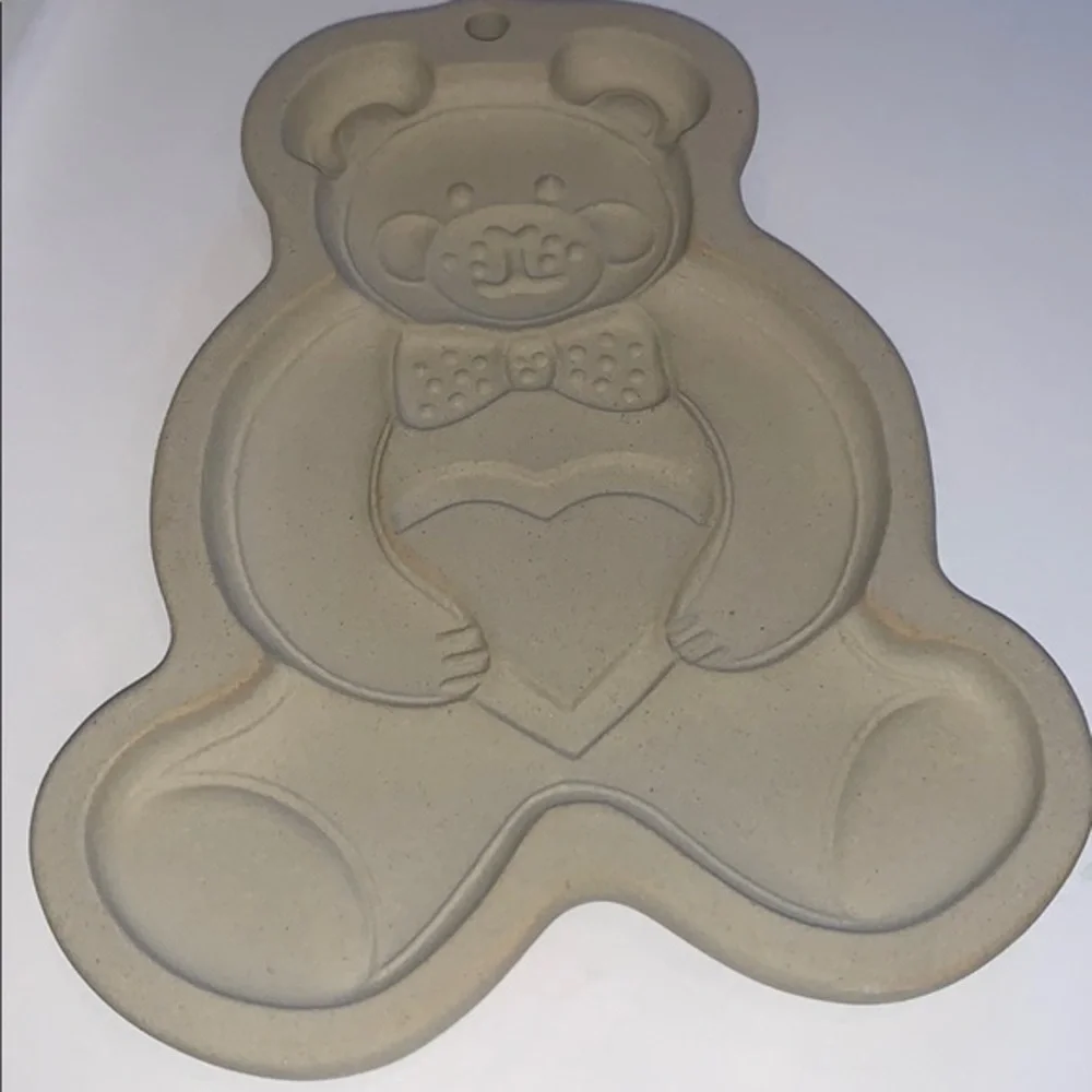 The Pampered Chef clay cookie mold